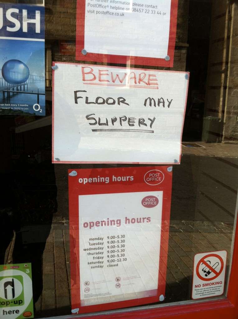 Sign reads: Beware. Floor may slippery